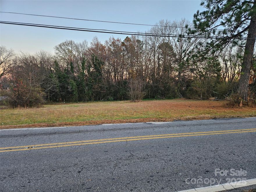 Back on market at a greatly reduced price. Commercial zoning and partially cleared .65 acre lot in Hickory, NC. This piece of property has very little slope and is even with the paved road frontage that spans approximately 124 feet. This has city water, city sewer, and natural gas available. Don't let this opportunity pass to purchase a desirable piece of land that is only a short distance to Interstate 40, US HWY 70, and US HWY 321.