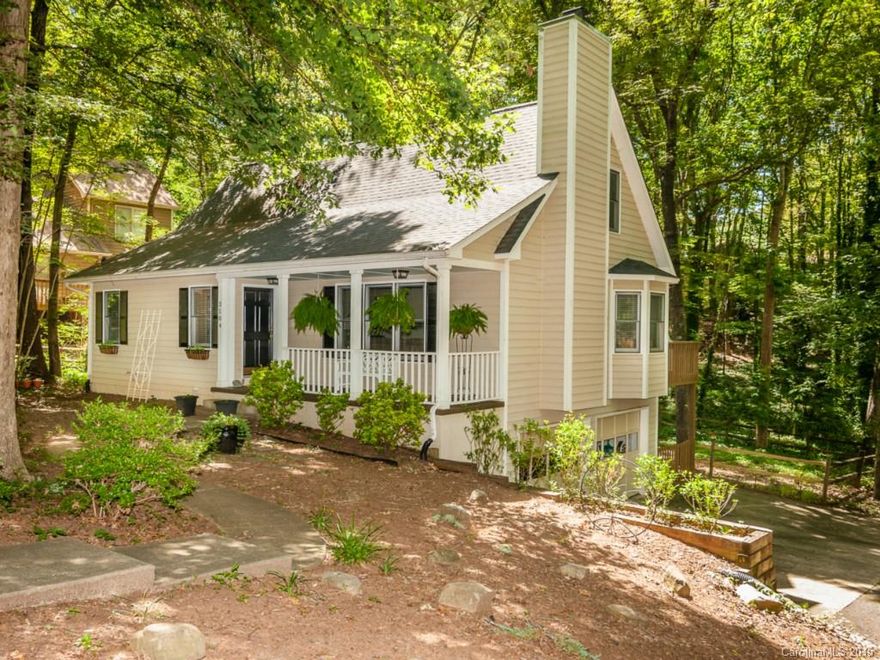 Charming home with an updated kitchen & master bath w/ his & her sinks. Beautiful hardwood floors though out the living room, dining room & kitchen. This home has three large bedrooms & 2 walk in closets to suit any persons needs for space. The bedrooms have extremely well maintained carpet through them. Walk-out finished basement! Large back deck overlooks fenced in yard that is shaded by many trees for wonderful summertime entertaining! Come take a look as this home won't last long!