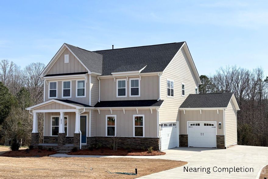 This NEW CONSTRUCTION home on 1+ acre homesite, offers an open floor plan designed to connect indoor & outdoor living. This stunning home features 10' ceilings on the first floor, 9' ceilings upstairs. The gourmet kitchen boasts double wall ovens, floor-to-ceiling cabinets, & quartz countertops, centered around an oversized island that connects to the living area that features a casual breakfast area, family room with modern gas fireplace, and formal dining area, with the family room opening to the large back deck! The open floor plan includes a guest suite on main, and elegant hardwood floors throughout 1st floor (except bath). Upstairs, the owner’s suite offers a tray ceiling, luxurious bath with dual vanities, quartz countertops, walk-in tiled shower & walk-in closet. A huge loft upstairs provides space for entertainment. Closing cost contribution available w/preferred lender! Some photos are representative of previously built home and may show upgrades not included in completed home on this site. Options, layouts, etc may differ from photos and some items listed in MLS may change during construction - please verify all options with community agent.  Other homesites & plans are available!