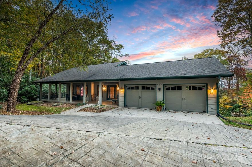 Buyers can’t believe how much livable space this home provides. As you arrive, the home’s large covered porch immediately welcomes you, showcasing a timeless and classic design perfectly suited to its mountain setting. While the exterior feels quietly elegant, the interior reveals a lower level that’s far more expansive than expected and perfect for hosting large groups. Designed for effortless living, this home delivers low-maintenance comfort—ideal as a refined primary residence, a lovely second retreat, or a flexible investment opportunity. The sellers are motivated and open to strong offers aligned with the home’s quality and setting.

Key Highlights

• True one-level living on the main floor

• Primary suite option 1 with French doors and excellent flow to living and dining areas

• Expansive finished lower level that lives like a second residence

• Multiple lower-level walkouts with abundant natural light

• Three spacious lower-level bedrooms, including an ensuite setup ideal as a second primary suite

• Attached two-car heated garage with gently sloped, paved driveway and abundant lower-level storage

• Wraparound covered porch and lower-level patio overlooking a wooded setting with seasonal mountain views

• Meticulously maintained, cleaned, and absolutely turnkey

The lower level offers a peaceful, private extension of the home that feels distinctly separate from upstairs—ideal for guests, multigenerational living, or flexible use. With multiple walkouts, generous ceiling heights, and abundant natural light, this level feels open, inviting, and intentionally designed—not like an afterthought. The finished space offers far more comfort and livability than typically expected, redefining what lower-level living can be. Outside, the gently sloping backyard enhances drainage and usability, and the patio area is ready for a hot tub surrounded by nature.

The home was intentionally designed with grading and construction that promote a dry, comfortable lower level. In addition to the finished living spaces, a substantial unfinished storage “bunker” provides an exceptional amount of clean, dry storage—ideal for outdoor gear, seasonal décor, or a workshop without sacrificing living space.

Built with care and efficiency in mind, the home features enhanced exterior wall insulation, durable hardboard siding, and a dual electric and propane HVAC system for year-round comfort and efficiency. The low-maintenance yard requires mowing only a few times per season, allowing more time to enjoy mountain living. Inside, granite countertops, wood floors and walls, and beautifully finished ceilings on both levels—no drop ceilings—create a warm, cohesive feel throughout the home.

Located in Gingercake Acres, a community gently woven into the forest, the setting is defined by winding roads, rhododendron, and mountain laurel that create a sense of calm and connection to nature. The home offers quick access to hiking trails, vistas, and the protected forest of Linville Gorge Wilderness just minutes away, as well as nearby Linville Falls. Enjoy crisp mountain air at nearly 4,000 feet in elevation and a well-maintained neighborhood with amenities including a swimming pool, pickleball courts, a community center, and woodland walking paths.

For those considering investment opportunities, the property has a strong rental history and is located in an HOA that allows short-term rentals (please note: STR guests do not have access to community amenities).

Beautifully maintained, energy-efficient, and thoughtfully designed, this home embodies relaxed mountain living. Whether you’re seeking a full-time residence, a peaceful vacation escape, or an investment property, it offers a rare blend of comfort, privacy, and natural beauty. Schedule your showing today and experience what makes this home—and this community—so special.