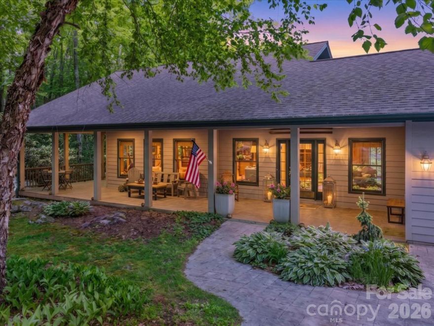 Beautifully reintroduced to the market, this warm and inviting mountain retreat offers the perfect blend of privacy, comfort, and short-term rental potential in the heart of North Carolina’s mountains. Nestled within the breathtaking Linville Gorge area — often referred to as the “Grand Canyon of the East” — the home is surrounded by mature hardwoods, lush mountain greenery, and some of the region’s most beloved outdoor destinations.

Thoughtfully designed for gathering, the property features expansive covered porches, multiple entertaining spaces, and seamless indoor-outdoor living that makes every season in the mountains feel special. Rich wood interiors and spacious common areas create the atmosphere of a private mountain lodge, ideal for hosting family, friends, or vacation guests. Multiple gathering zones throughout the home provide flexibility for entertaining, game nights, relaxing weekends, and memorable mountain getaways.

Located just minutes from Upper Creek Falls hike with a natural waterslide, Table Rock Mountain, Grandfather Mountain, Linville Falls, Banner Elk, Sugar Mountain, Beech Mountain, hiking trails, wineries, golf, fishing, and year-round adventure, the location offers exceptional appeal for both personal enjoyment and vacation rental demand.

Short-term rentals are permitted, making this an outstanding opportunity for investors, second-home buyers, or anyone seeking a turnkey Blue Ridge escape with income potential.

For owners seeking both retreat and connection, the neighborhood also offers a welcoming sense of community, including weekly summer gatherings and social events that create opportunities to connect with neighbors while still enjoying the privacy and tranquility of mountain living.

Whether enjoyed as a personal retreat or a luxury vacation rental, this property captures the relaxed elegance, natural beauty, and gathering-focused lifestyle buyers are searching for.

Please note: while short-term rentals are allowed, guests do not have access to community pool or neighborhood amenities.