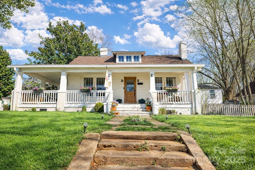 330 Charlotte Avenue is a charming 3-bedroom, 1-bath home situated on a lovely lot in the heart of Rock Hill. This property features a beautiful wrap around front porch and a spacious backyard, perfect for relaxing or entertaining. Conveniently located within walking distance to the , Glencairn Gardens, and vibrant downtown Rock Hill, offering easy access to shopping, dining, and recreational amenities. This home is ready for you to move in or add some personal updates and call it home for years to come!