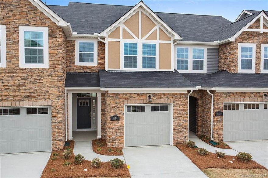 Brand New Townhome in desirable Fort Mill location! Beautiful home features open concept floor plan with beautiful kitchen, oversized kitchen Island, extra large pantry storage closet and DOUBLE MASTER SUITES! Home features Hardwoods, tile bath floors, trey ceiling in both Masters, granite w/tile backsplash in kitchen & more. 10' x 10' rear patio with privacy screening and 1 car attached garage. Great location near community pool and play area.
