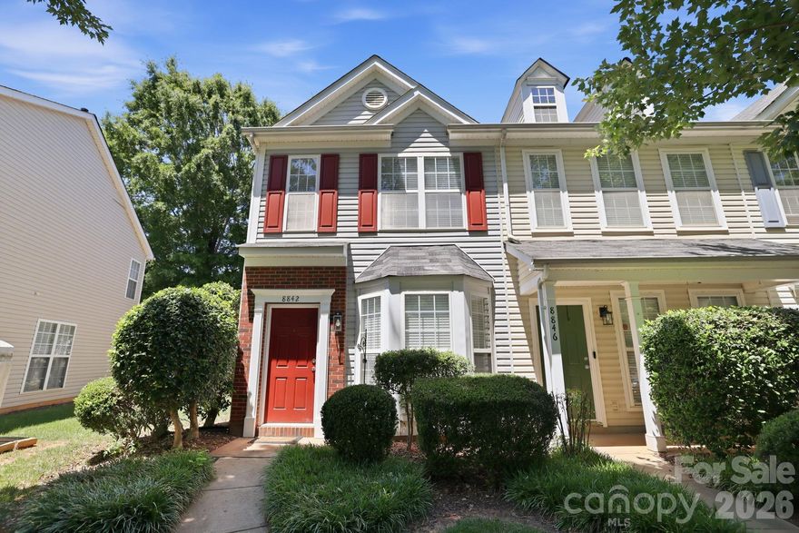Beautiful end-unit townhome featuring two spacious primary bedrooms, each with its own private en-suite bathroom. Convenient second-floor laundry area. The open, upgraded kitchen offers abundant natural light and French doors that lead to the back patio, perfect for relaxing or entertaining. Enjoy the large bay window in the den and a cozy corner fireplace accessible from both the dining area and the living space. Ideally located just minutes from I-485, the airport, and Uptown Charlotte. HOA dues include water and trash pickup.