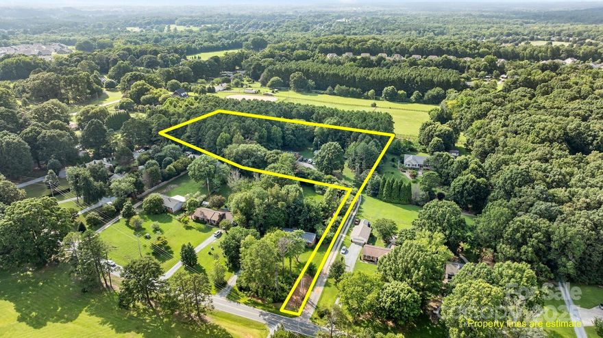 4.77-acre level lot with no HOA—offering privacy, space, and endless potential. Whether you're looking to expand, build, or simply enjoy the land, this property provides the perfect setting. A 3-bedroom, 2-bath ranch-style home sits on the property, ready to live in or customize to your vision. Located in the Weddington school district, zoned for Wesley Chapel Elementary, Weddington Middle, and Weddington High.

Seller is willing to offer $5,000 towards rate but down or closing cost whichever the buyer chooses!

Developers and builders welcome as this property can be subdivided and has huge potential for multiple home sites!