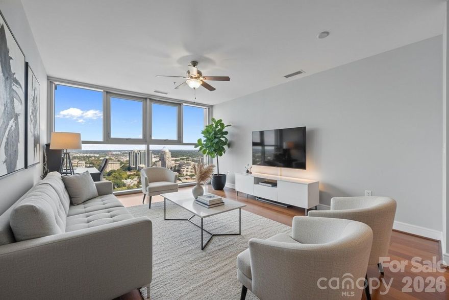 Luxurious 26th-floor condo in Trademark with stunning panoramic views of the Charlotte skyline. Bright open living space overlooking the city’s most vibrant sunset and night views. Fresh paint, HVAC replaced in late 2023, and an ideal parking space on P4 located steps from the elevator for added convenience.
Enjoy 7th-floor amenities including a resort-style pool, lounge deck, and modern fitness center. Unbeatable walkability to Uptown offices, dining, sports venues, and entertainment—perfect for those who value both lifestyle and time efficiency. This isn’t just a condo. It’s your private front-row seat to Uptown life.