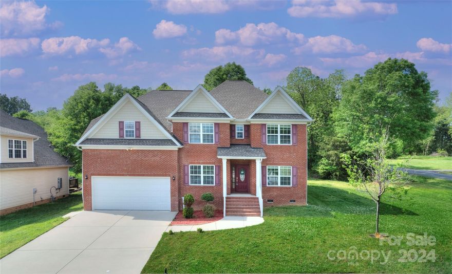 This full-brick Home boasts 6 bedrooms and 5.5 bathrooms, nestled on a corner lot, it's truly a rare find exuding elegance and comfort.
The main floor invites you into a dining room and a versatile bedroom, perfect for a home office or guest suite. The kitchen adorned with granite countertops and bespoke cabinets, flow seamlessly into a cozy breakfast nook. Vaulted ceilings in the living room bathe the space in natural light, creating an atmosphere of tranquility.

The main floor master suite offers a luxurious escape with a spacious bathroom featuring garden tubs and a walk-in closet.

Upstairs, discover a second master suite with a charming reading nook or nursery, complete with ample storage space. Two additional bedrooms share a convenient Jack and Jill bathroom, while the sixth bedroom enjoys its own full bath.

Outside, the backyard beckons for outdoor enjoyment, whether it's lounging on the patio or exploring the lush surroundings.