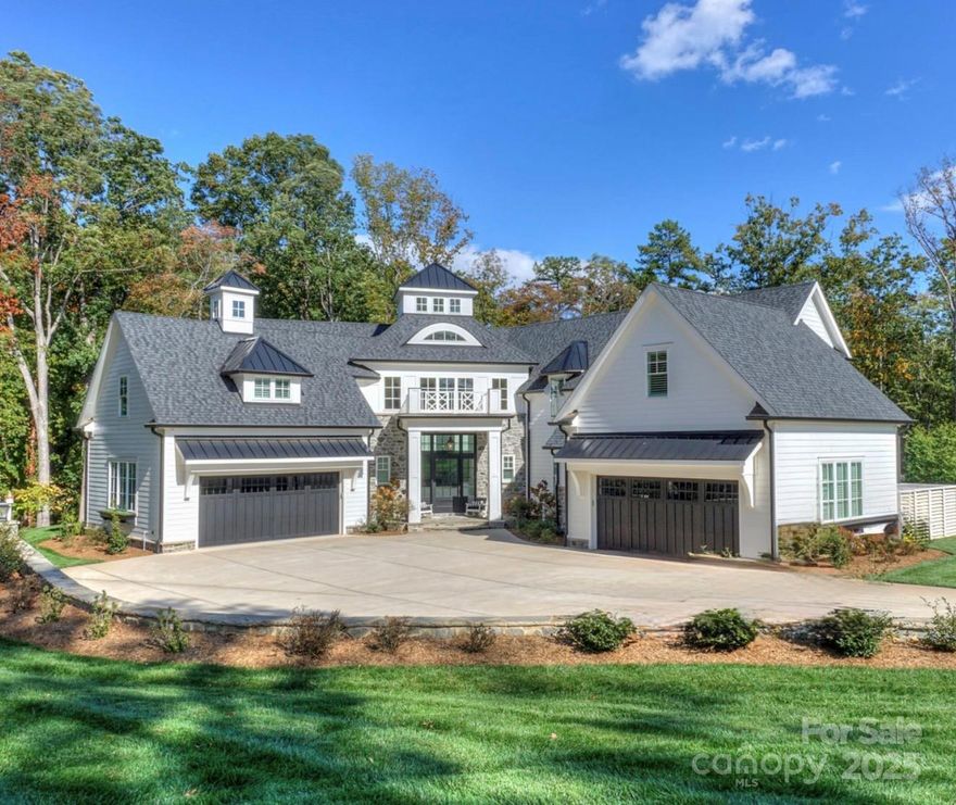 Experience timeless architecture and refined craftsmanship in this custom-built Cape Cod–inspired waterfront home in Saylor’s Watch, one of Lake Norman’s most exclusive enclaves!  Built by Patrick Joseph Distinctive Homes, this residence blends relaxed coastal charm with meticulous detail, offering a lifestyle defined by beauty, comfort, and connection to the water!  

Spanning over 6,300 square feet, the home opens through a glass-paneled entry door into a soaring two-story foyer wrapped in shiplap and natural light. Every finish has been carefully curated—from wide-plank white oak floors to handcrafted millwork, designer lighting, and layered textures that create a sense of calm sophistication throughout!

The heart of the home is the chef’s kitchen, with marble countertops and an expansive island!  Premium Wolf, Sub-Zero, and JennAir appliances, custom cabinetry, and a fully equipped scullery make this kitchen both elegant and efficient. The adjoining dining area, with its cupola skylight and access to the grilling patio, flows seamlessly into the great room—where a beautiful white birch fireplace, coffered ceiling, and lake views set the tone for gatherings large and small!

The main-level owner’s suite is a private retreat, complete with heated marble floors, freestanding tub, Toto toilet and custom closet with center island for added storage!  Upstairs, two additional bedrooms, each with en-suite baths and an additional bonus room/office enjoy access to the upper level lakeside terrace. Additional spaces include a home theater and yet another bedroom for added space or home office.

Designed for effortless living, this home includes two laundry rooms, both upstairs and down, & TWO 2-car garage spaces with lift & epoxy floors, Control4 automation, whole-house water softener, 22KW Generac generator, and a sealed, climate-controlled crawl space. Every bedroom is pre-wired for television and audio, and Trane HVAC units maintain zoned comfort.

Outdoor living is nothing short of extraordinary!  A heated saltwater pool and spa feature stone decking, LED color lighting, and mosaic tile details, while a built-in bar area with Thermador refrigeration and U-Line ice maker serves both the great room and the pool terrace. The covered porch, complete with retractable Phantom screens, bluestone flooring, and a full Lynx outdoor kitchen, invites dining and relaxation year-round. The upper lakefront terrace captures sunrise views over the water—an inspiring start to each day!!

A shared dock with power and water sits just behind the home, offering easy access for boating and lake enjoyment.

Located minutes from Trump National Golf Club Charlotte’s premier amenities, this property offers luxurious lakeside living in a prime Lake Norman setting!  From its Cape Cod elegance to its exceptional craftsmanship and thoughtful layout, 103 Saylor’s Watch Lane delivers the perfect blend of sophistication and lakeside living!