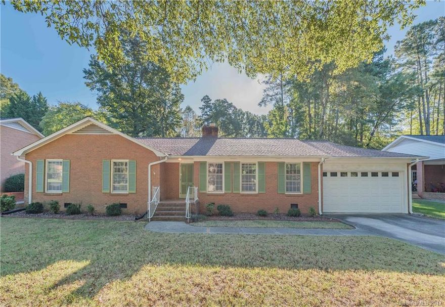 Make this your dream home! Full brick ranch now available in highly sought after Sherwood Forest  Original oak hardwoods, beautiful moldings, 3 full baths, tons of storage, built-ins and gas fireplace in family room. Almost 1/2 acre includes a majestic oak in front, private back yard with patio and storage building. Double garage with work shop.  Flex space can be used as a second master, 2nd living quarters or large rec room. Cotswold/Southpark area, easy commute to Uptown.  Don't miss this one