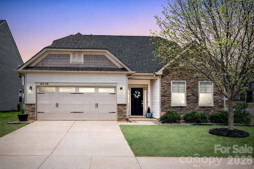 If privacy is a priority, this beautifully maintained ranch home is tucked away in amenity-rich Walnut Creek near the peaceful pond. Offering true one-story living with a two-car garage, this immaculate home features a crisp, clean white kitchen and open floorplan.

Upgraded luxury vinyl plank flooring, crown molding, custom blinds, and a neutral palette create a bright, airy feel throughout. 

The kitchen features custom cabinetry and lighting, granite countertops, stainless steel appliances, gas cooktop, wall oven, spacious pantry, and a large island with extra storage. Refrigerator conveys, along with a whole-house water filtration system. The dining area opens seamlessly to the covered patio with afternoon shade and a secluded, low-maintenance backyard retreat that is fully fenced in.

The primary suite offers a tray ceiling, direct access to the patio, and a well-appointed bath with dual sinks, soaking tub, separate shower, and a custom walk-in closet.

A cozy office provides the perfect work-from-home space, along with a convenient drop zone off the garage entry.  Spacious laundry room with a window offers upper and lower cabinets for organization plus a sink.  This meticulously maintained home offers added peace of mind with an active termite bond and a consistent annual HVAC maintenance program.

Enjoy resort-style amenities including pools, spas, picnic areas, fitness center, pond, and walking trails that connect to the Carolina Thread Trail, along with social events like book clubs, Bunco, poker, and bingo...ask to see the very active community newsletter. Adjacent parks offer baseball and softball fields, soccer fields, pickleball courts, and a field house with concessions too. Sidewalk-lined streets leading to the pond make this more than a home—it’s a lifestyle.  

Ideally located in Indian Land near downtown Waxhaw, Marvin, and Ballantyne, with quick access to Highway 521 for shopping and dining while benefiting from lower South Carolina taxes.