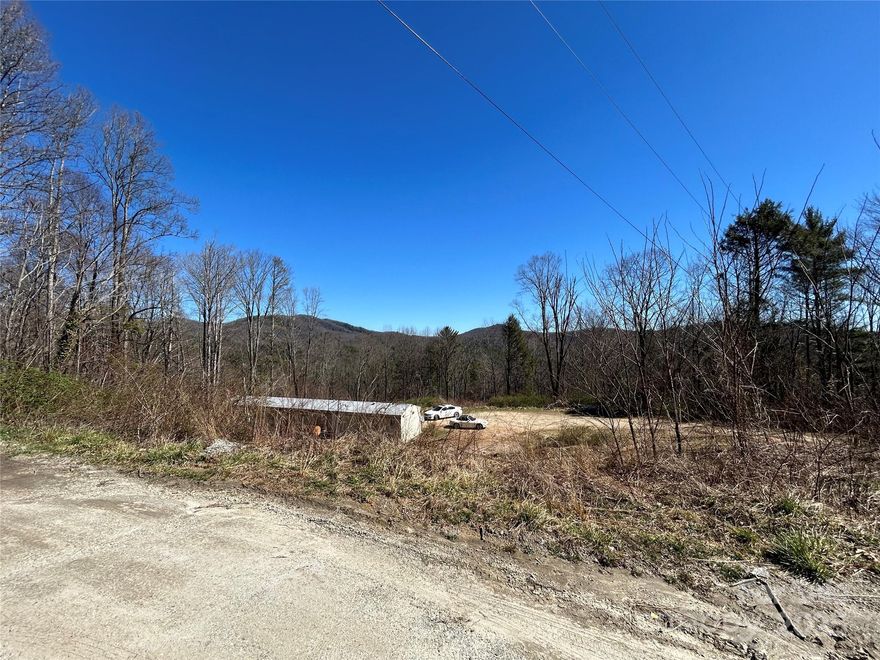 Beautiful 1.98-acre unrestricted parcel featuring a designated homesite and a scenic view. Enjoy the freedom of no HOA or restrictions—perfect for building your dream home or retreat. Plenty of space, privacy, and possibilities