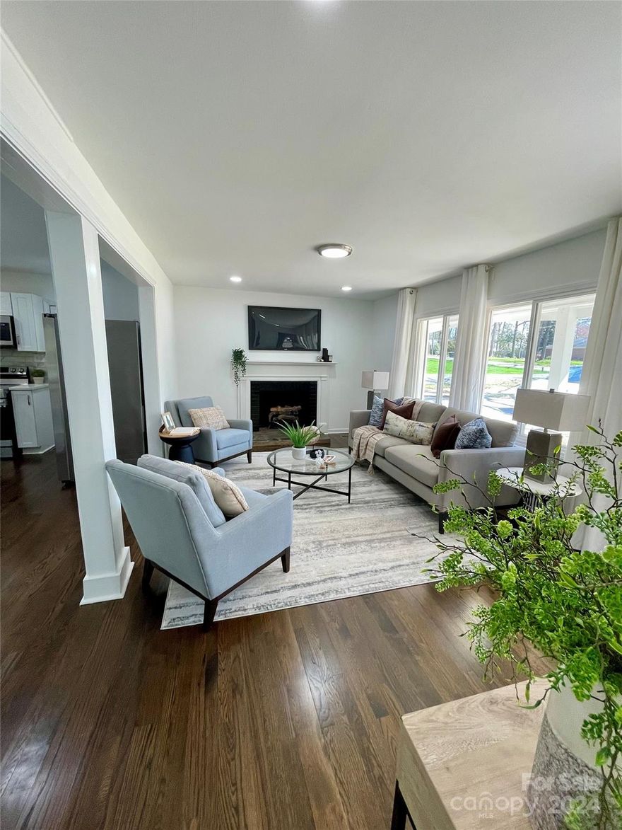 Beautifully updated ranch in close proximity to shopping, restaurants, Rollingwood Country Club, 74! 3 bedroom, 2 bathroom with 1 car garage. Gleaming Bruce hardwood floors throughout! New roof, new kitchen, expansive covered deck in the rear. Large, flat lot with endless possibilities. No HOA! Easy to show!