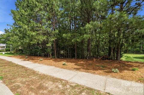 Photo of 113 Delancy Street, Locust, NC 28097 (MLS # 4390909)