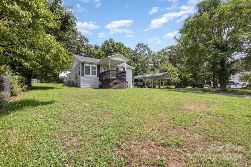 Discover the potential of this charming single-family home nestled on a generously sized lot. This property features a cozy shared living/dining space and spacious eat-in kitchen  -  all ready for your personal touch and creative vision. Ideal for DIY enthusiasts and those looking to customize their dream home, this fixer-upper promises endless possibilities.

The exterior boasts a convenient carport, providing shelter for your vehicle, and multiple storage sheds, perfect for all your storage needs or potential workshop space. The large lot offers ample room for gardening, outdoor activities, or even future expansion.

Embrace the opportunity to transform this house into a personalized retreat. With a little TLC, this property could become a perfect starter home or an investment opportunity.

Don't miss out on this chance to create your own home. Schedule a showing today and envision the endless potential this charming house holds!