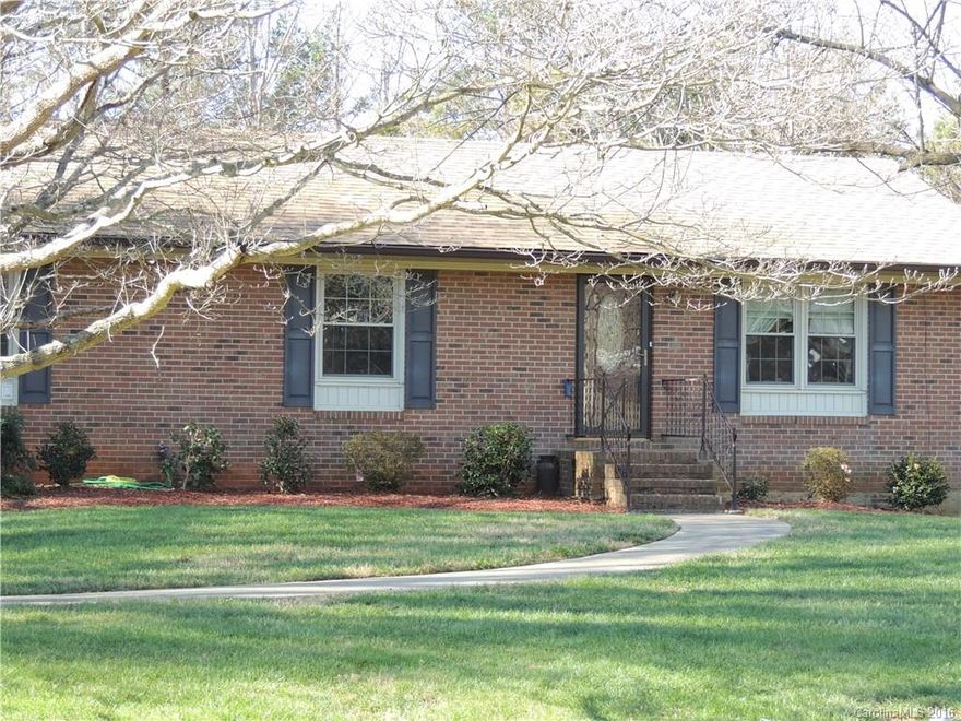 Beautifully maintained brick home in desirable Huntersville area.  New roof in2009, New HVAC in 2013, New windows and soffit 2005, New exterior doors and new gravel drive way 2015.  Extra large bedrooms all have double closets.  All baths have been updated.  Possible second living quarters with private entrance in lower level.  Beautifully landscaped yard with attached garage and detached 2 car carport. Nice large lot with no HOA's.
