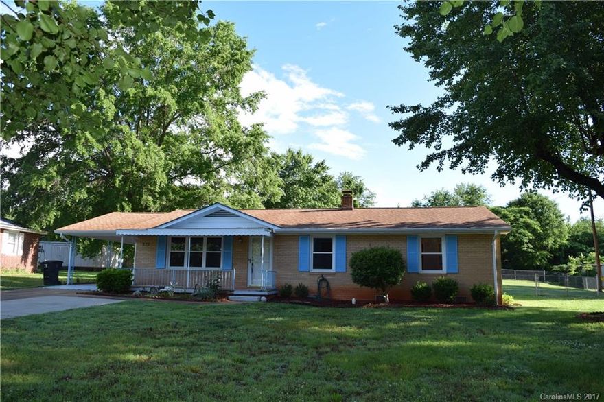 Nice brick ranch house with 6 year old architectural shingles, double pane vinyl windows and a fenced-in back yard. House has three bedrooms and 1.5 bathrooms. HVAC is heat pump. There is a concrete driveway with extra pad on the right. Laundry room is in storage room at back of the one-car carport. All appliances convey. Storage building at back of .46 acre lot also conveys.