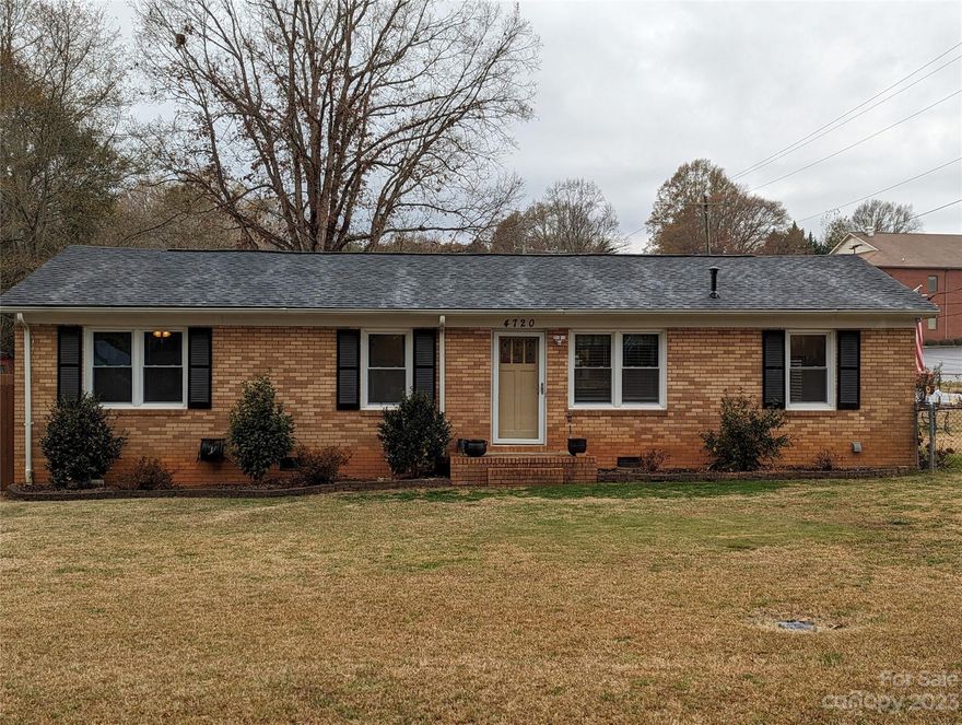 PRICE REDUCTION on this beautifully updated all-brick ranch home located in the Chapel Crove area of Gastonia. If you are looking for a one-level home, here it is!  Even better... it is completely move-in ready. All appliances remain. Just pack your things and enjoy your new home. Gorgeous wood floors in Living Room, Kitchen and Dining Room.  Nice-sized bedrooms can fit your needs. The yard is spacious for all your outdoor activities. Fenced rear yard offers a relaxing swing, an open patio area and a fantastic wired outbuilding for all your goodies and workshop needs. You cannot find a better property at this price. Attic stair pulldown access is in the carport & offers storage overhead. This property qualifies for the America's Home Grant® Program. Contact me for more info!