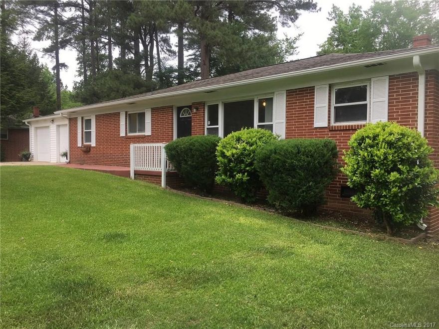 Beautiful move-in-ready brick ranch on over half acre lot. Featuring a spacious eat-in kitchen, double oven, hardwood floors throughout living room and bedrooms with a large bonus room off of the kitchen. NEW roof in 2017, 2 car garage, deck over looking the ample back yard. Close access to I-85, minutes to Concord and shopping.