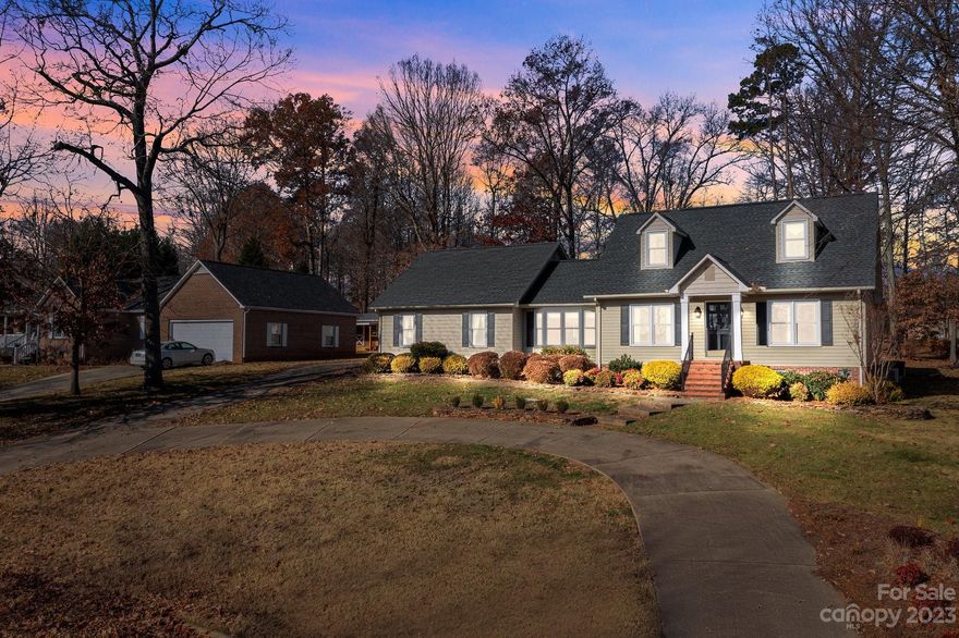 Welcoming and radiant this 3BR-2.5BA home is located in a well maintained and well desired development, Corbin Hills. Corbin Hills is a public golf course community and is in close proximity to downtown Salisbury, many grocery stores, shopping and excellent restaurants. This property features an attached 2 car garage along with an oversized detached garage with walk-up storage that could easily be transformed into a bonus room/additional living space. Main level living boasts a primary suite, laundry room, open kitchen/dining concept, living room and a large family room with gas log fireplace. Upstairs offers 2 guest bedrooms and a full bathroom. The back bricked patio is a perfect spot to entertain large crowds or just sit and enjoy the outdoors. This gorgeous home is bound to check all your boxes plus some!