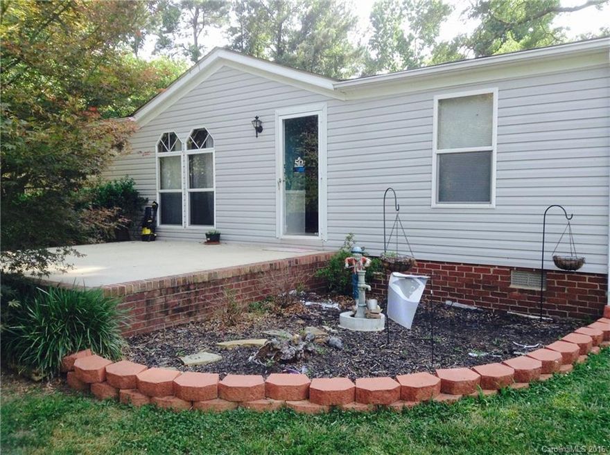 Located near off 160, near 521, this lovely home is easy to access and will provide a nice home for someone on a budget.  Features Include: 3 bedrooms with a split bedroom plan;  a large great room with fireplace; dining area;  Kitchen with plenty of cabinets, dishwasher, range & fridge, and a breakfast area as well; Good size master, and master bath has dual vanities, a garden tub & separate shower; screened porch; wired storage building.