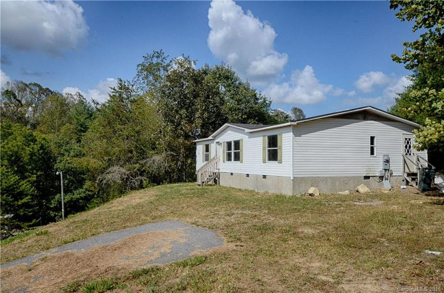 Multiple offers received - PLEASE SUBMIT HIGHEST AND BEST OFFER BY 12:00 PM on SATURDAY, 10/15. Investors and Do-It-Yourselfers, take note!  Doublewide on almost an acre lot taken down to studs and subfloor letting you decide how to finish it. Endless possibilities!  A great opportunity to buy and renovate to your tastes. Long-range views and a treehouse that conveys. Property is wired, plumbed and has HVAC ductwork in place. A real deal for a smart shopper.