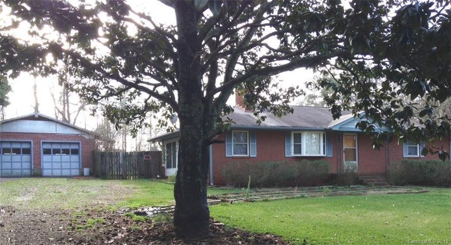 Peaceful neighborhood off Mallard Creek. Cool landscaping, fireplace, SPACIOUS kitchen with dual ceiling fans. Porch AND deck. Stove and refrigerator included.