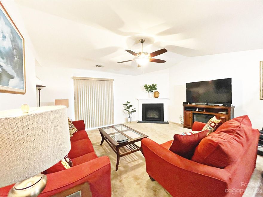 You are home! This is one you don't want to miss. This cute ranch-style home is only 5 years old and delivers great convenience to all major highways and is close to shopping, entertainment and more. It features three bedrooms and two bath with an open floor plan, electric fireplace, huge outside patio and vinyl fenced in backyard for privacy that is perfect when entertaining/grilling and enjoying time with those you love. You'll love the primary bedroom that is spacious with a large garden tub in the bathroom for relaxing in after a long day. There is also a huge shed with double barn doors and shelving for extra storage that is being conveyed with the property (retails for $6000) Come and take a look at this beautiful home today!