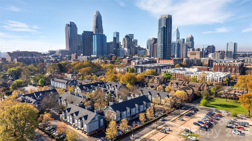 UPSCALE URBAN CAREFREE LIVING at Fourth Ward 1 Bedroom / 1 Bath condo! Bedroom has a walk-in closet and great additional storage/closet space. This unit comes with a dedicated parking spot too! The living area features SLIDING GLASS DOORS to let in TONS OF LIGHT, and kitchen boasts stainless steel appliances. POOL VIEW FROM UNIT.  Chock full of amenities, Fourth Ward Square features a swimming pool, barbecue area, fire pit, fitness center and clubhouse! It's located within walking distance of Uptown restaurants and entertainment venues, as well as great outdoor options, including path through Fourth Ward Park. Frigidaire Refrigerator (2024) and washer & dryer included. SPECIAL ASSESSMENT HAS BEEN PAID IN FULL.  Seller ALSO willing to pay six months of HOA DUES ONLY with a Full Price Offer!! Dedicated parking spot #1. New HVAC 2024 and new roof 2024! Condo interior was painted 2024. Be sure to check out the pool and fitness center with your clients! There is a wait list for rentals, RENTAL CAP IS AT IT'S MAX. Community Features: Club House, Dog Park, Green Space, Fitness Center, Outdoor Pool, Community Rooftop Terrace, Grilling Area, Street Lights, Assigned Parking.  Can obtain one(+more ) additional parking spots via city ParkIt for 30-50$+/-year.  Safety sprinklers throughout the complex. Close to area parks, restaurants, shopping, the light rail, Truist Field, Bank of America Stadium, & Spectrum Center - Welcome Home!