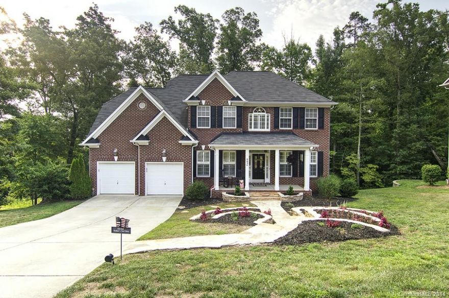 Fabulous mountain-like retreat in the heart of Highland Creek! Immaculate 6BR/4BA bsmnt home complete w/2nd living quarters features full kitchen. Perfect for the in-laws! Upgrades galore! Hrdwds throughout most of 1st & 2nd floors. Office/library w/built-in bookshelves. Kitchen complete w/high-end chef's appliances. Full bed/bath on 1st floor. Relax in beautiful sunroom w/gorgeous wooded views. Unbelievable MSTR BR/BA boasts beautiful tile work. Walkout bsmnt w/lots of storage. Extended patio.