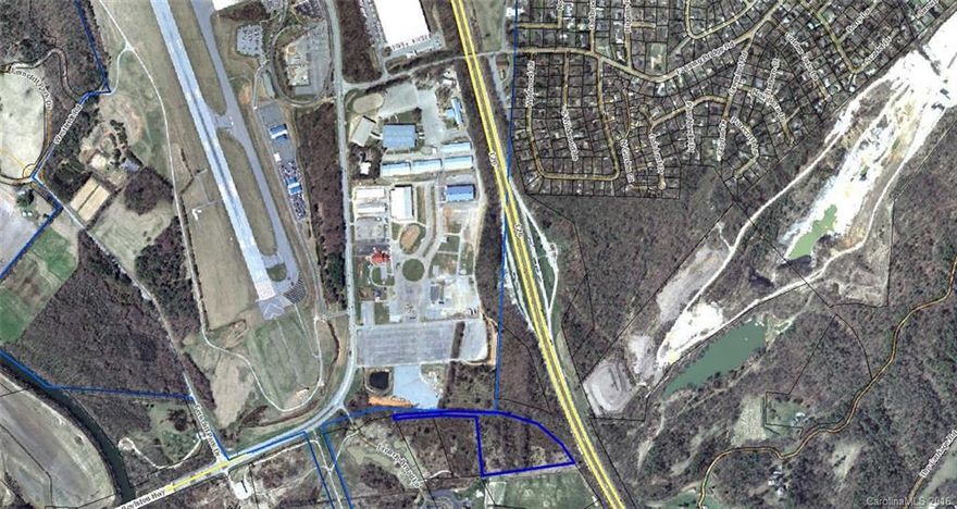 Property is one of 2 Parcels available, 14 acres total. Unique opportunity to develop property located next to Broadmoor Golf Course and Western Carolina Agricultural Center. Directly across from Asheville Regional airport.