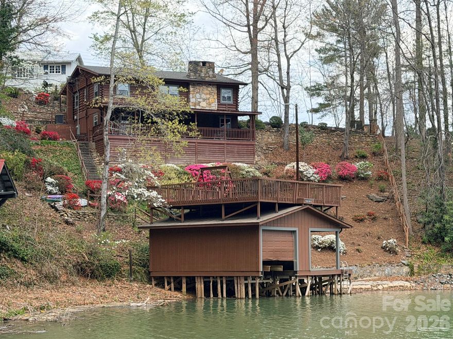 Lake Lure Lakefront...........Rare opportunity to buy a fully furnished, 4 bedroom, 2 1/2 bath, lakefront home on Lake Lure for only $1,100,000. This vintage home is in great condition and is located in a private cove away from the busyness of the main channel. Located just off Picnic Point on Rock Point Road and just 3 minutes to Ingles Grocery. This Gem will not wait, so buy while it's available!