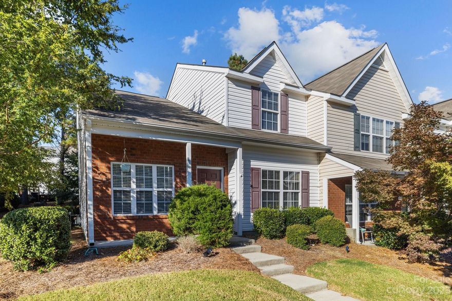 Assumable VA loan at 3.8%! Stunning END unit townhome featuring a primary bedroom on the main floor! With a brand new AC unit installed in July 2023 & new vinyl plank flooring on 1st floor. The Great Room has magnificent vaulted ceilings that fill the space with an abundance of natural light. The kitchen has stainless steel appliances, beautiful granite countertops, white cabinets, & breakfast bar. The primary bedroom on the main floor is both spacious and inviting, equipped with double closets for ample storage. The en-suite bath has been remodeled with a new walk-in shower installed. Upstairs, you'll discover two generously sized bedrooms, one with a HUGE walk-in closet.  New sliding glass doors installed on tub in the full bath on the 2nd level ensures comfort and convenience. Situated in a prime location,  close to shopping centers, a variety of dining options, and provides easy access to the nearby I-77.