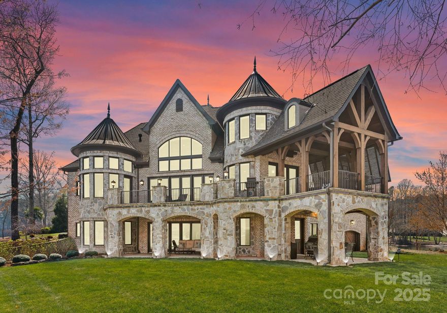 This newly remodeled luxury home offers a rare opportunity to experience lavish Lake Norman living at its finest. Situated in the highly sought-after Sailview community, the home features exquisite modern design and breathtaking views of Lake Norman throughout the home. The completely custom, open floor plan has been freshly updated with exquisite modern taste. Premium upgrades can be found in every corner of the home, from heated tile flooring, Control4 Smart Home automation, updated appliances, theater room and much more! Step outside and discover a private 1.2-acre peninsula overlooking main channel views. Lake lovers will delight in the white sand beach affixed to the cove side of the property, perfect for summer entertaining. Residents of Sailview have access to a range of community amenities, including tennis and pickleball courts, 25-meter swimming pool, clubhouse for events and gatherings, sand volleyball court, and multiple playgrounds throughout the neighborhood.