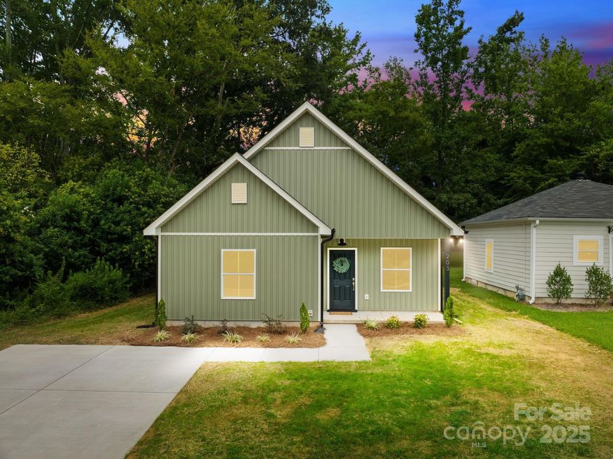 Practical Luxury is defined in this New Construction gem in Rock Hill. This beautifully crafted 3-bed, 2-bath home offers 1,250 sq ft of modern living space in the heart of this vibrant city. Just a stone’s throw from Winthrop University, enjoy easy access to shopping, dining, parks, and commuter routes—all while living in your private oasis. By popular demand, we brought back the rich, custom dark green cabinets in this kitchen that will take your breath away (and make ALL your guests green with envy)! SS stove, deep sink, and a large island round out the perfect heart of your home. Decorative millwork helps to define the spaces. Primary suite with private bath, dual vanities, and generous closet space. Additional bedrooms provide privacy and great storage. With brand-new systems for peace of mind, Low-maintenance yard, and private driveway.  No matter what you are looking for, this home offers unbeatable desirability, functionality, and location. Explore this amazing home today!