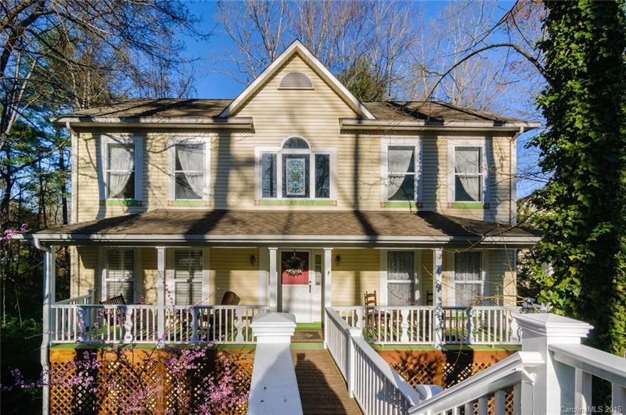 Spacious tradtional Kenilworth home on sub dividable lot. Features open-concept floor plan, master on main, 2nd Master up, plus office, hardwood floors and carpeting, eat-in kitchen, covered rocking chair porch, and 2 car garage w/ workshop space. Wooded views tons of windows. Kitchen has all new granite counter-tops and stainless Whirlpool appliances. Ideal location-close to everything- minutes to downtown, Biltmore Village, Mission, & Whole Foods. Short walk to neighborhood parks and tennis.