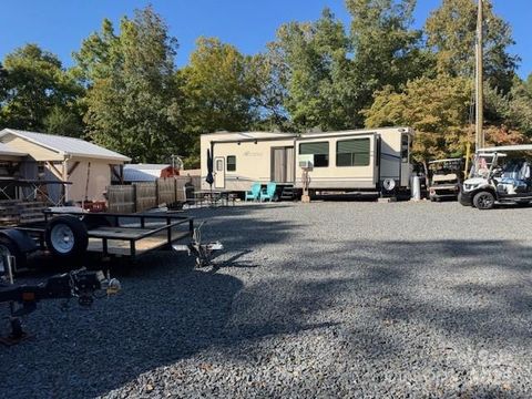 Photo of 107 Lanyard Trail, Mount Gilead, NC 27306 (MLS # 4309453)