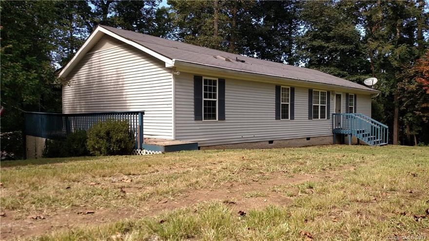 Great family home (3/2) in Candler.  Located only minutes from elementary school & high school.  Great neighborhood location.  House features a long covered back porch / a flat to sloping yard / multiple parking / split bedroom layout / open format kitchen & dining area with breakfast bar / master suite / new HVAC unit / new carpet