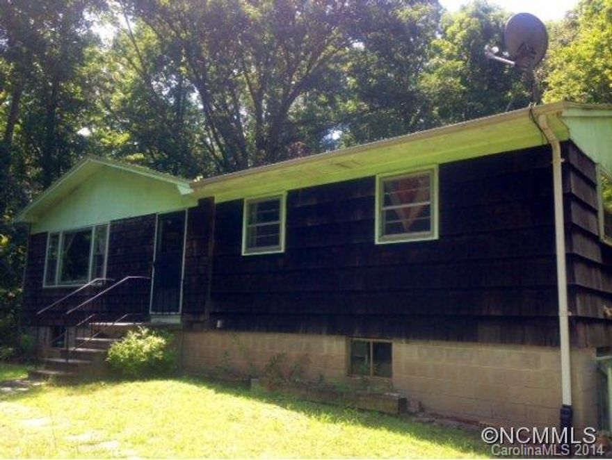 Great location and yard, original wood floors, need a little updating.