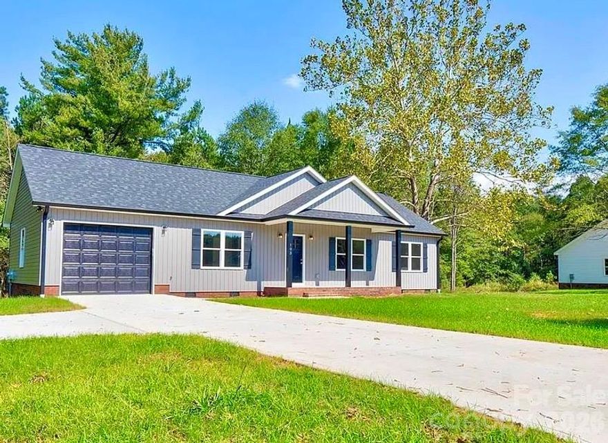 Check out this like-new construction, just 15 minutes from uptown Shelby. There is so much to love about this beautifully designed 3-bedroom, 2 full bath property offering space, comfort, and potential. 
The inviting open-concept layout features a spacious kitchen with a large island—perfect for entertaining, meal prep, and gathering with family and friends. The split-bedroom floor plan offers privacy, with a generous primary suite tucked away from the secondary bedrooms.The laundry room is thoughtfully designed with a mudroom area and utility sink—ideal for keeping everyday life organized and tidy.
Enjoy peaceful mornings and relaxing evenings on the covered front porch or unwind on the back deck overlooking the beautifully fenced yard and serene wooded views beyond. The over-sized garage provides ample space for vehicles, tools, and hobbies. Situated on a roomy lot of nearly 0.7 acres, this property provides plenty of room to add a storage shed, build an ADU, or even expand with an additional garage.
With its spacious layout, like-new construction, scenic setting, and room to grow, this home offers the perfect blend of comfort and opportunity.No HOA