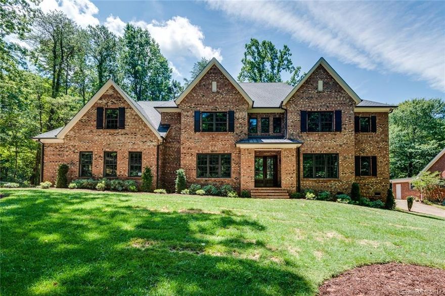 Luxurious new construction sitting on a nice & slightly elevated .45 acre lot that's nestled in a quiet community & surrounded by everything great that Charlotte has to offer.  Full Brick 2 story w/ over-sized 3 car garage & spacious covered porch overlooking your private backyard. 10' ceilings on main, 9' ceilings upstairs & cathedral, coffered & trayed ceilings sprinkled in. 1st & 2nd Floor Master Suites, Chef's Kitchen w/ custom cabinetry & island. Clad windows, heavy moulding and much more!!