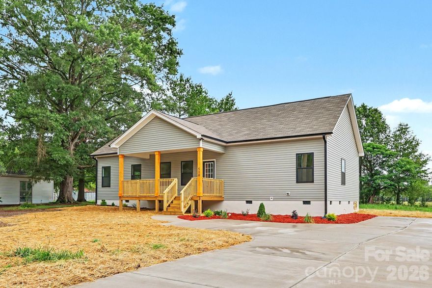 Welcome to this handsome new construction home nestled in a quiet neighborhood — where peaceful living meets everyday convenience. Thoughtfully designed to maximize both comfort and function, this home delivers exceptional value with features you don’t often find at this price.
Step inside to an open floor plan, anchored by a beautifully equipped kitchen with a generous island, perfect for entertaining or everyday living, plus a large walk-in pantry for exceptional storage. The primary suite offers a true retreat, complete with his-and-her walk-in closets and an en-suite bathroom featuring a large, tiled shower. Two additional bedrooms are equally well-appointed, and all three bedrooms feature tray ceilings and walk-in closets — an uncommon touch that adds both style and functionality.
Enjoy the outdoors from either your covered front porch or covered back porch, ideal for relaxing mornings or unwinding evenings, rain or shine.
All of this, and you’re less than five minutes from the shops, restaurants, cafés, and grocery stores of downtown Marshville — the best of quiet neighborhood living with everything you need close at hand.  Come see it for yourself.