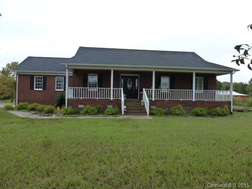 This is the farm for you. Custom built brick ranch home split floor plan, vaulted bead board ceiling w/recessed lights,  fireplace, kitchen comes complete, baths updated. Come and relax on the full length country porch while you watch the horses or cattle graze. There is a 24X60 shop, a 5 stall barn w/ tack room to help keep up with the farm and animals. Enjoy the 50 + acres all fenced and crossed fenced complete w/ 2 ponds all spring fed. All a must see.