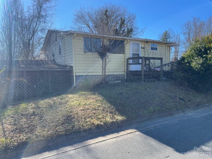 Estate being sold AS IS convenient to most everything. Corner lot in City only minutes to , dining, shopping,.the recreation center that the Village people sing about etc. About 4 minutes to I-40. This 3bedroom 2 bath home will need some updates and TLC would make a great rental or investment. Full basement with additional room og 240 sq. ft. Main level ceilings are appox. 7 ft.