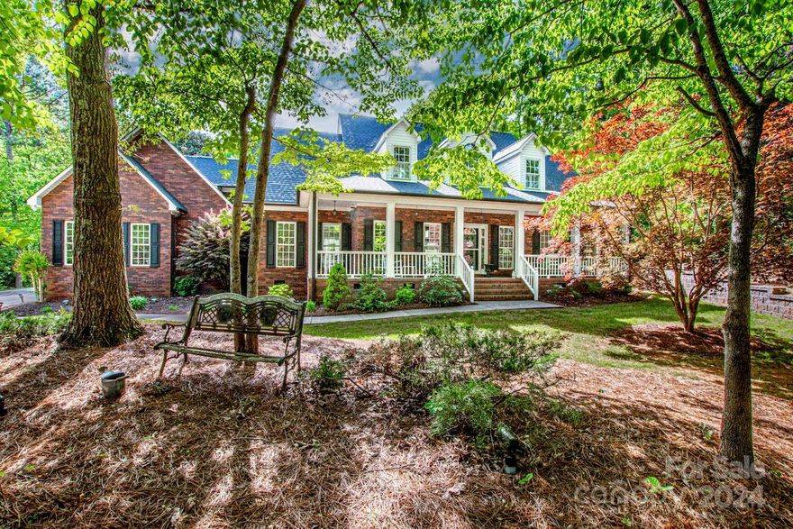 Charming custom full brick home on 1.43 acre cul-de-sac lot, in a fantastic location. The welcoming covered front porch exudes warmth to relax & enjoy the peaceful surroundings. The impressive FR has vaulted ceilings & a massive stone FP that serves as the focal point, creating a cozy ambiance.  The abundance of windows adds natural light & offers views of a private backyard & covered back porch. Kitchen has ample cabinet space, granite, a center island w/a gas stovetop (propane). Main level primary suite offers a sitting area, extensive moldings & a private bath w/granite, walk-in closet, huge tile shower, ceiling fan & wood cabinets. Upstairs, you'll find generously sized BR's & a bonus, which provides extra living space to customize to suit your needs. Side load oversized 2GAR w/lots of storage cabinets. Septic Permit is for a 3BR, but an extra room upstairs has a closet & is used as a BR. Low Cabarrus County Taxes. Bicycle rack on GAR ceiling, does not convey. Roof new (2019)