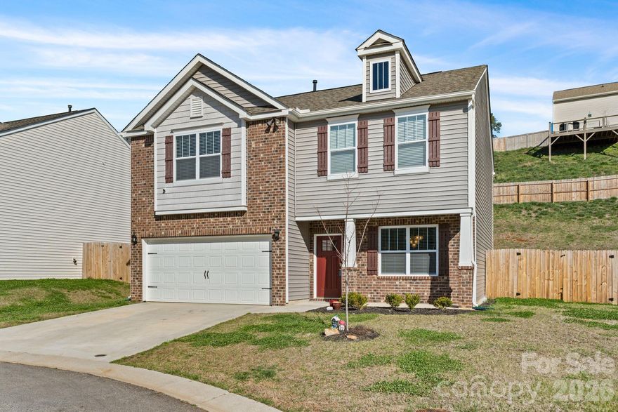 Absolutely the best deal for a 4-bedroom home in Asheville! Well constructed, and well maintained 3-year old home on a cul-de-sac in a great neighborhood, only 10 minutes to Downtown. Property across the cul-de-sac is HOA owned and will not be built on! You'll have great main level living space, including a family room with fireplace, a dining area and kitchen all in one "great room," and still have a formal dining room! Large primary suite with lots of natural light. Fully fenced rear yard. 2 car attached garage, and plenty of driveway parking as well. Move in with confidence!