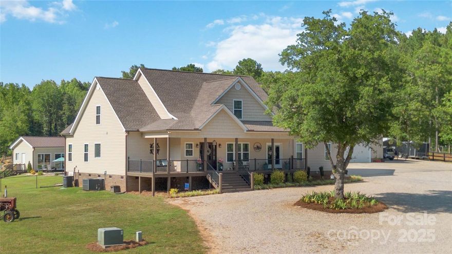 Embrace Country Living on this Breathtaking Gated 16.99 Acre Estate. Nestled Perfectly in Serene Seclusion, this Custom Built Home Showcases the Perfect Open Floor Plan w/the Primary Suite & an Additional Bedroom on the Main.  Rich Hardwood Flooring in Great Rm, Kitchen, Office & Dining Area.  The Kitchen Boast Granite Counter Tops, Ceramic Tile Back Splash, Breakfast Bar, Newer Appliances & a Walk In Pantry. Upstairs find 2 Additional Bedrooms, an Extra Large Bonus Rm & Play Area. Outside is Where you will want to Spend your time, whether it is on the Rocking Chair Front Porch, Screened Rear Porch or Cooling off in the Salt Water In Ground Pool w/a Pool House.  30x40 Wired Detached Garage, 3 Stall Barn, Plenty of Storage for Tractors, Livestock & Recreational Vehicles. The Entire Property is Fenced - 10 of the Acres are Fenced into 3 Pastured Areas. 5 Wooded Trails for Recreational Vehicles or Horse Back Riding. You don't want to miss this one!