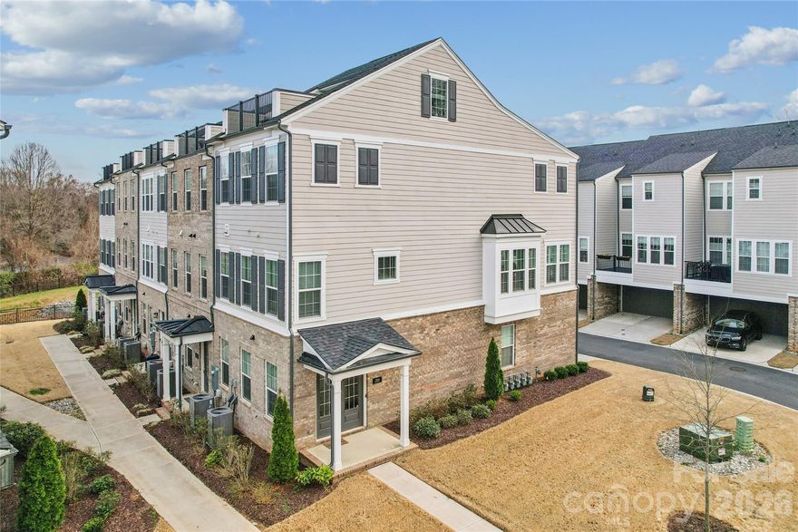 Listed Below Tax Value! A perfectly positioned end-unit townhome in Elizabeth Glen! This boutique townhome neighbor within historic Elizabeth is known for its charm, tree lined streets, and close proximity to Uptown, Novant, Atrium, dining, and local favorites, 200 Emerson Avenue offers refined, low maintenance living in one of Charlotte’s most sought-after neighborhoods.  The lower level features a double door side entrance with a welcoming foyer and includes a private guest suite with full bath, and access to the attached two car garage with an extended eave that adds to the architectural charm. The Main level is designed for entertaining and everyday living with an open concept layout filled with natural light, tall ceilings, crown molding, and light natural oak flooring with warm undertones. The kitchen anchors the space with a six-burner gas range, built in microwave, wall oven, oversized island with seating for five, ceiling height cabinetry with glass accents and lighting. A private balcony and sunroom with plantation shutters extend the living area.  The upper level features a primary suite with a trey ceiling, dedicated seating area, two custom walk-in closets, and a spa inspired bath with dual vanity and oversized tiled shower with built in bench. A secondary bedroom with private bath and the laundry closet completes this level. The fourth floor offers a versatile bonus room with attached powder room and access to a private rooftop terrace, delivering exceptional living in the heart of Elizabeth! Walk to Plaza Midwood, Eastover and Myers Park! 

.