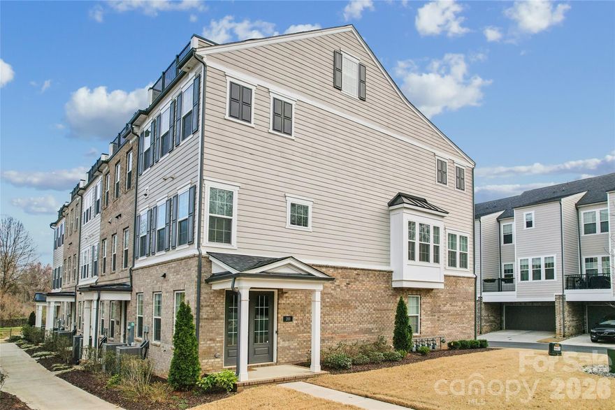 A perfectly positioned end-unit townhome in Elizabeth Glen! This boutique townhome neighbor within historic Elizabeth is known for its charm, tree lined streets, and close proximity to Uptown, Novant, Atrium, dining, and local favorites, 200 Emerson Avenue offers refined, low maintenance living in one of Charlotte’s most sought-after neighborhoods.  The lower level features a double door side entrance with a welcoming foyer and includes a private guest suite with full bath, and access to the attached two car garage with an extended eave that adds to the architectural charm. The Main level is designed for entertaining and everyday living with an open concept layout filled with natural light, tall ceilings, crown molding, and light natural oak flooring with warm undertones. The kitchen anchors the space with a six-burner gas range, built in microwave, wall oven, oversized island with seating for five, ceiling height cabinetry with glass accents and lighting. A private balcony and sunroom with plantation shutters extend the living area.  The upper level features a primary suite with a trey ceiling, dedicated seating area, two custom walk-in closets, and a spa inspired bath with dual vanity and oversized tiled shower with built in bench. A secondary bedroom with private bath and the laundry closet completes this level. The fourth floor offers a versatile bonus room with attached powder room and access to a private rooftop terrace, delivering exceptional living in the heart of Elizabeth! Walk to Plaza Midwood, Eastover and Myers Park! 

.