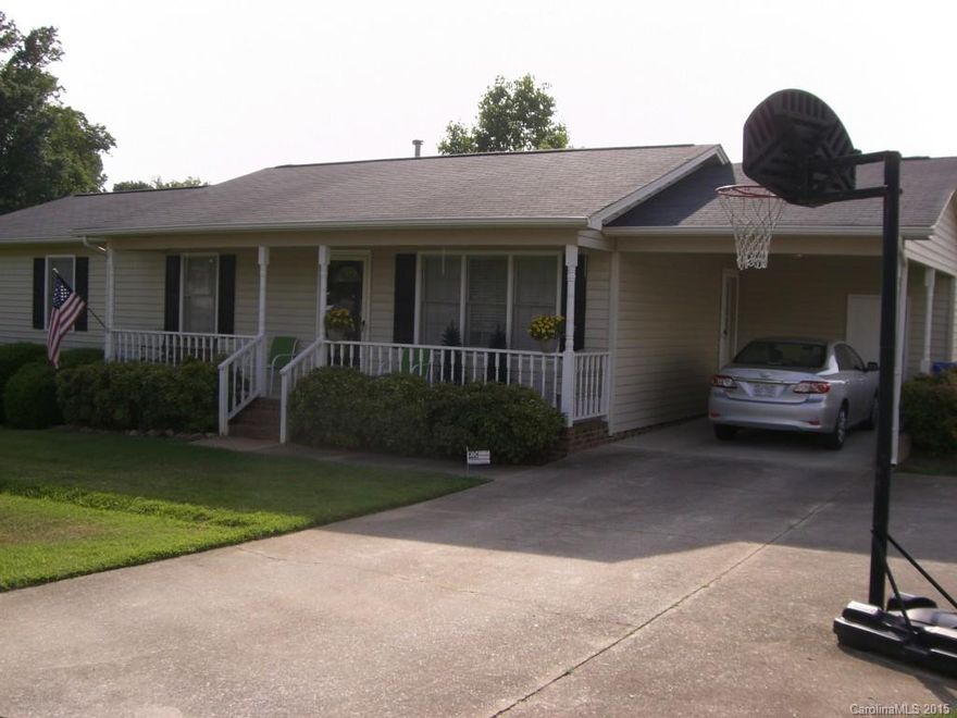 Well maintained 3/2 home in estab. nbhd on quiet cul de sac. Easy access to Hwy 74, Hwy 18 & Hwy 150. Close to schools, grocery stores & downtown. Covered rocking chair front porch. Nice deck, storage rm and storage bldg. Laundry is inside, 1 car carport. new roof 2014.