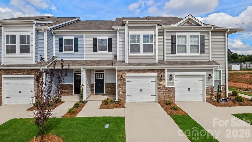 Enjoy simple living with our new construction townhomes! Located in the new build community of Tap Root Farms, this property comes with all the amenities enjoyed by our single family homes. The amenity center includes a resort style pool, clubhouse, fitness center, pickleball courts, dog park and playground! This floorplan offers a large kitchen complete with island, ss appliances and tile backsplash, an open living area and plenty of storage space. The primary suite with attached bath, along with two other bedrooms can be found on the second floor. *Home features are subject to change without notice. Internet service not included. Sq footages are approximate*